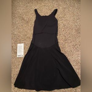 Size 8 Lululemon tennis dress in black. Only worn once!